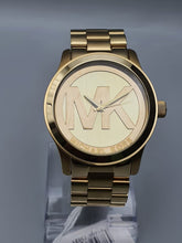 Michael Kors Women’s Quartz Gold Stainless Steel Champagne Dial 45mm Watch MK5473